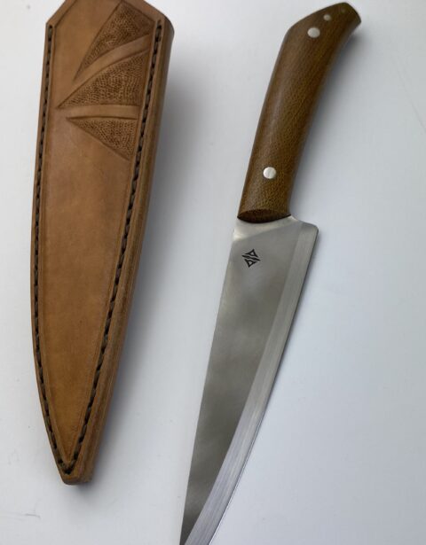 Cuchillo Criollito FX con vaina de cuero caramelo repujada y cabo de micarta